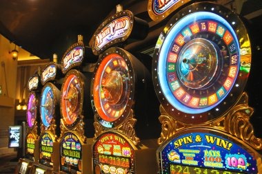 holiday slot mobile app interface showing live football markets and casino tables